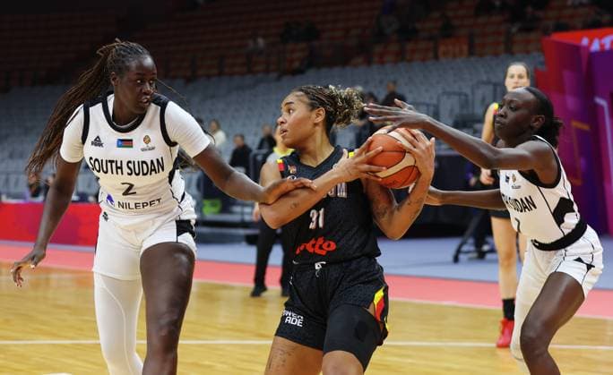 South Sudan s Adut Bulgak and Belgium s Maxuella Lisowa Mbaka fight for the ball during a basket game between Belgium s national team, Nationalteam Belgian Cats and South Sudan, in Wuhan, China, on Sunday 15 March 2026, the fourth game (out of 5) of the qualifications phase for the World Cup Basket tournament. NIKOLAxKRSTIC  x167535033x