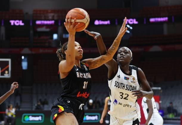 Belgium s Maxuella Lisowa Mbaka and South Sudan s Piath Gabriel fight for the ball during a basket game between Belgium s national team, Nationalteam Belgian Cats and South Sudan, in Wuhan, China, on Sunday 15 March 2026, the fourth game (out of 5) of the qualifications phase for the World Cup Basket tournament. NIKOLAxKRSTIC  x167535487x