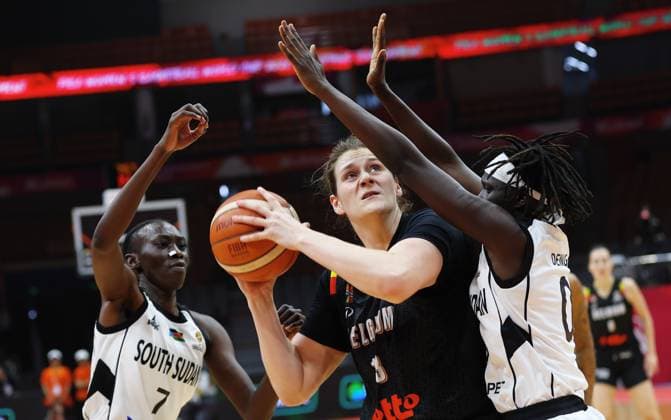 Belgium s Kyara Linskens and South Sudan s Delicia Washington fight for the ball during a basket game between Belgium s national team, Nationalteam Belgian Cats and South Sudan, in Wuhan, China, on Sunday 15 March 2026, the fourth game (out of 5) of the qualifications phase for the World Cup Basket tournament. NIKOLAxKRSTIC  x167536268x