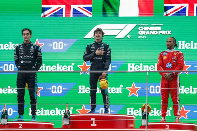 CHINA-MOTORSPORTS F1-SHANGHAI From Left to Right, Mercedes™ George Russell, Mercedes™ Kimi Antonelli and Ferrari™s Lewis Hamilton on the podium after coming in top 3 at Shanghai International Circuit at the F1 Chinese Grand Prix, Shanghai, China, March 15, 2026. NEXPHER Peter Li SHANGHAI