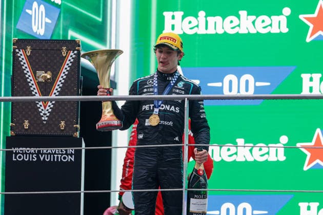 CHINA-MOTORSPORTS F1-SHANGHAI Mercedes™ Kimi Antonelli holding up his trophy on stage after winning at Shanghai International Circuit at the F1 Chinese Grand Prix, Shanghai, China, March 15, 2026. NEXPHER Peter Li SHANGHAI