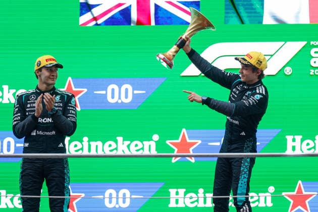 CHINA-MOTORSPORTS F1-SHANGHAI Mercedes™ George Russell and Mercedes™ Kimi Antonelli on the podium after coming in top 3 at Shanghai International Circuit at the F1 Chinese Grand Prix, Shanghai, China, March 15, 2026. NEXPHER Peter Li SHANGHAI