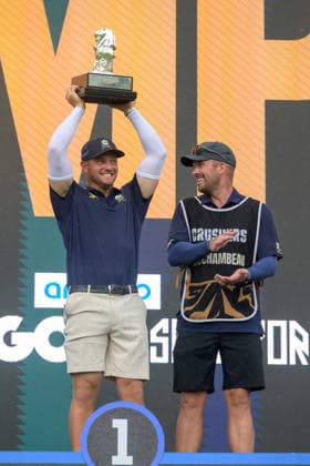 March 15, 2026, Singapore, Ingapore, Singapore: USAs Bryson DeChambeau wins the Singapore tournament, beating Richard T. Lee from Canada in a pne hole tie-breaker on the 18th hole. DeChambeau raises the trophy with his caddie, Greg Bodine, on the podium.Final Round of the LIV Golf in Singapore Singapore Singapore - ZUMAr144 20260315_zap_r144_036 Copyright: xJaynexRussellx