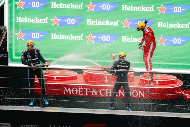 Shanghai Formula 1 Chinese Grand Prix - Kimi Antonelli Wins ANDREA KIMI ANTONELLI (ITA) of Mercedes-AMG PETRONAS Formula One Team 12 celebrating his first Grand Prix win in Formula1 with LEWIS HAMILTON (GBR) of Scuderia Ferrari HP 44 and GEORGE RUSSELL (GBR) of Mercedes-AMG PETRONAS Formula One Team 63 on Sunday during the 2026 Formula 1 Heineken Chinese Grand Prix at the Shanghai Audi International Circuit on March 15, 2026. Credit: Photo by Antoine Lapeyre ABACAPRESS.COM Shanghai China  Copyright: xLapeyrexAntoine ABACAx