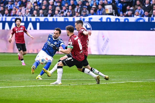 15 03 2026, Football, 2 Bundesliga, Season 2025 2026, Matchday 26, FC Schalke 04 Hannover 96, Goal chance Kenan Karaman FC Schalke 04 , Enzo Leopold Hannover 96 xRHR PHOTO YYx Copyright: KROEGER RHR-FOTOx RHR-FOTO YY