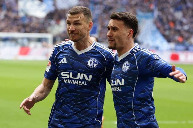 Gelsenkirchen, Germany, 15 03 26, Edin Dzeko FC Schalke 04 celebrates after his goal for 1 0 with Dejan Ljubicic FC Schalke 04 during the Bundesliga 2 match between FC Schalke 04 Hannover 96 at the Veltins Arena in Gelsenkirchen Photo by Joachim Bywaletz DFB DFL REGULATIONS PROHIBIT ANY USE OF PHOTOGRAPHS AS IMAGE SEQUENCES AND OR QUASI VIDEO Copyright: JoachimxBywaletz xJB-Sportfoto