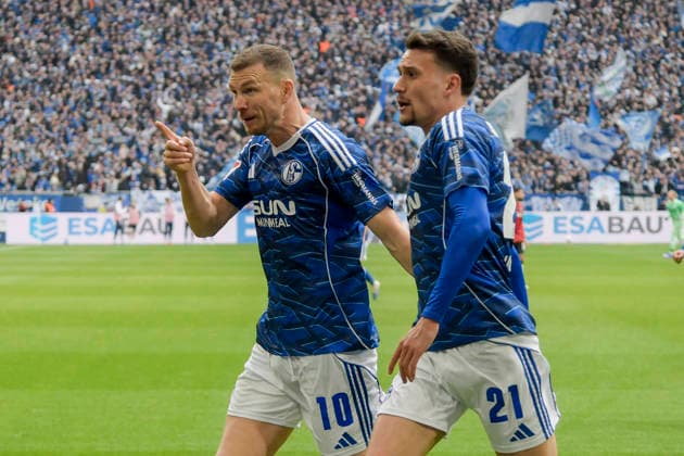 Edin Dzeko Schalke 10 celebrates after scoring the 1 0 goal with Dejan Ljubicic Schalke 21 15 03 2026 ¢ Football ¢ FC Schalke 04 vs Hannover 96, Veltins Arena, Gelsenkirchen, DFB DFL REGULATIONS PROHIBIT ANY USE OF PHOTOGRAPHS AS IMAGE SEQUENCES AND OR QUASI VIDEO Copyright: xpepphotox xHorstxMauelshagenx pep00321, pep_20260315_hm_309853