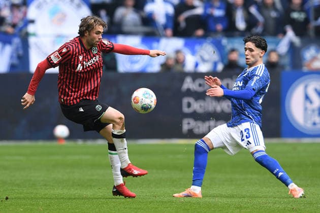 Soccer 2 Bundesliga 26 Matchday FC Schalke 04 Hannover 96 on 15 03 2026 at the Veltins Arena in Gelsenkirchen Kolja Nuno Oudenne Hannover , left Soufiane El Faouzi Schalke , right DFL regulations prohibit any use of photographs as image sequences and or quasi video xRx