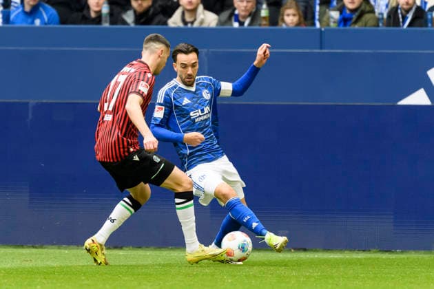 Bastian Allgeier Hannover 96 and Kenan Karaman FC Schalke battle for the ball during the 2 Bundesliga match between FC Schalke 04 and Hannover 96 at Veltins Arena on March 15, 2026 in Gelsenkirchen, Germany, Germany Photo by Max Maiwald DeFodi Images Bastian Allgeier Hannover 96 and Kenan Karaman FC Schalke battle for the ball during the 2 Bundesliga match between FC Schalke 04 and Hannover 96 at Veltins Arena on March 15, 2026 in Gelsenkirchen, Germany Photo by Max Maiwald DeFodi Images Photo by Max Maiwald DeFodi Images