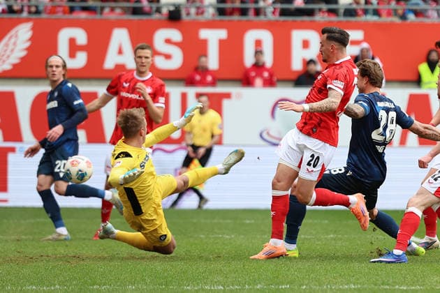 15 03 2026, xrekx, Fußball 2 Bundesliga, 1 FC Kaiserslautern Karlsruher SC v l Goal shot to 2 0 by Mergim Berisha 1 FC Kaiserslautern Hans Christian Bernat Karlsruher SC DFL DFB REGULATIONS PROHIBIT ANY USE OF PHOTOGRAPHS as IMAGE SEQUENCES and or QUASI VIDEO Kaiserslautern