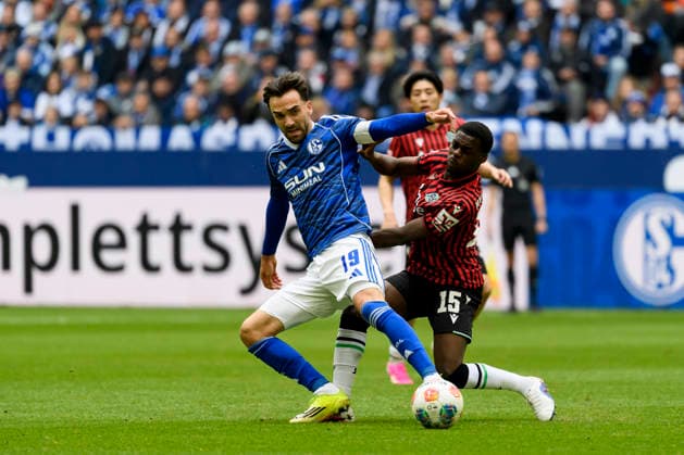 Kenan Karaman FC Schalke and Noel Aseko Hannover 96 battle for the ball during the 2 Bundesliga match between FC Schalke 04 and Hannover 96 at Veltins Arena on March 15, 2026 in Gelsenkirchen, Germany, Germany Photo by Max Maiwald DeFodi Images Kenan Karaman FC Schalke and Noel Aseko Hannover 96 battle for the ball during the 2 Bundesliga match between FC Schalke 04 and Hannover 96 at Veltins Arena on March 15, 2026 in Gelsenkirchen, Germany Photo by Max Maiwald DeFodi Images Photo by Max Maiwald DeFodi Images
