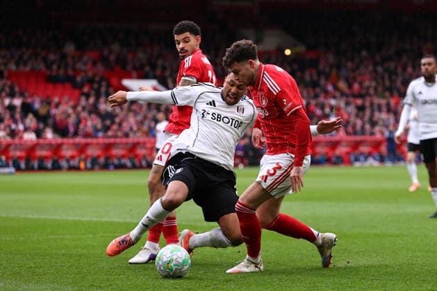 Nottingham Forest v Fulham, Premier League Kenny Tete of Fulham tempts to slide tackle Neco Williams of Nottingham Forest during the Nottingham Forest v Fulham Premier League match at the City Ground, West Bridgford, England on 15 March 2026 Credit: Ryan Crockett Every Second Media Editorial use only. All images are copyright Every Second Media Limited. No images may be reproduced without prior permission. All rights reserved. Premier League and Football League images are subject to licensing agreements with Football DataCo Limited. see https: www.football-dataco.com Copyright: xIMAGO EveryxSecondxMediax ESM-1859-0022 RyanxCrockettx xEveryxSecondxMediax