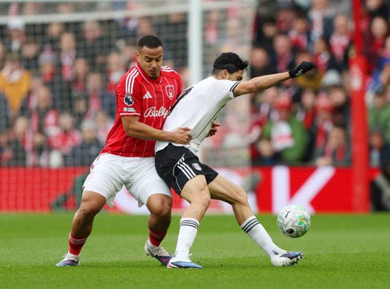 Nottingham, England, 15th March 2026. Murillo of Nottingham Forest and Raul JimÃ nez of Fulham during the Nottingham Forest vs Fulham Premier League match at the City Ground, Nottingham. Picture credit should read: Gareth Evans Sportimage EDITORIAL USE ONLY. No use with unauthorised audio, video, data, fixture lists, club league logos or live services. Online in-match use limited to 120 images, no video emulation. No use in betting, games or single club league player publications. SPI_018_GE_NFFC_vs_FFC SPI-4604-0018
