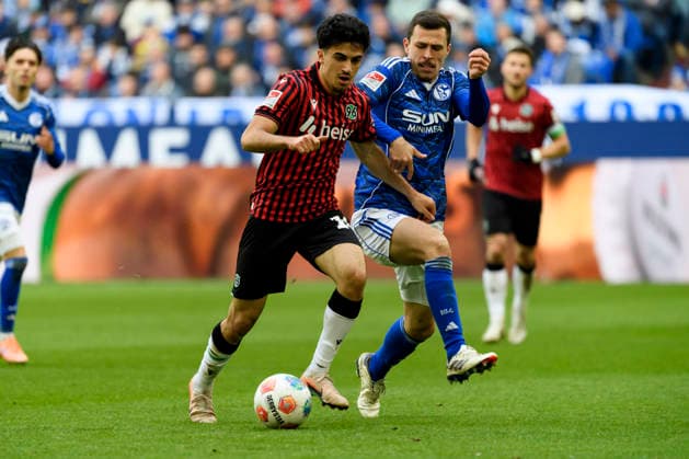 Husseyn Chakroun Hannover 96 and Ron Schallenberg FC Schalke battle for the ball during the 2 Bundesliga match between FC Schalke 04 and Hannover 96, Veltins Arena on March 15, 2026 in Gelsenkirchen, Germany, Germany Photo by Max Maiwald DeFodi Images Husseyn Chakroun Hannover 96 and Ron Schallenberg FC Schalke battle for the ball during the 2 Bundesliga match between FC Schalke 04 and Hannover 96 at Veltins Arena on March 15, 2026 in Gelsenkirchen, Germany Photo by Max Maiwald DeFodi Images Photo by Max Maiwald DeFodi Images