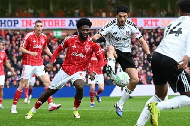 Ola Aina of Nottingham Forest and Raul Jimà nez of Fulham Nottingham Forest v Fulham, Premier League, Football, City Ground, Nottingham, UK - 15 Mar 2026Nottingham City Ground United Kingdom EDITORIAL USE ONLY No use with unauthorised audio, video, data, fixture lists, club league logos or live services. Online in-match use limited to 120 images, no video emulation. No use in betting, games or single club league player publications. Copyright: xAnnaxGowthorpe Shutterstockx 16757313ap