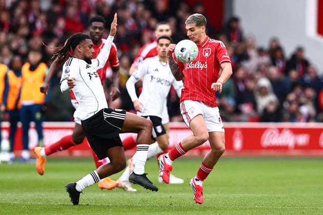 Nottingham Forest v Fulham, Premier League Alex Iwobi of Fulham and Nicolas Dominguez of Nottingham Forest go for the ball during the Nottingham Forest v Fulham Premier League match at the City Ground, West Bridgford, England on 15 March 2026 Credit: Ryan Crockett Every Second Media Editorial use only. All images are copyright Every Second Media Limited. No images may be reproduced without prior permission. All rights reserved. Premier League and Football League images are subject to licensing agreements with Football DataCo Limited. see https: www.football-dataco.com Copyright: xIMAGO EveryxSecondxMediax ESM-1859-0036 RyanxCrockettx xEveryxSecondxMediax