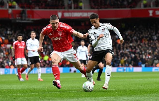 Nikola Milenkovic of Nottingham Forest and Joshua King of Fulham Nottingham Forest v Fulham, Premier League, Football, City Ground, Nottingham, UK - 15 Mar 2026Nottingham City Ground United Kingdom EDITORIAL USE ONLY No use with unauthorised audio, video, data, fixture lists, club league logos or live services. Online in-match use limited to 120 images, no video emulation. No use in betting, games or single club league player publications. Copyright: xAnnaxGowthorpe Shutterstockx 16757313ar