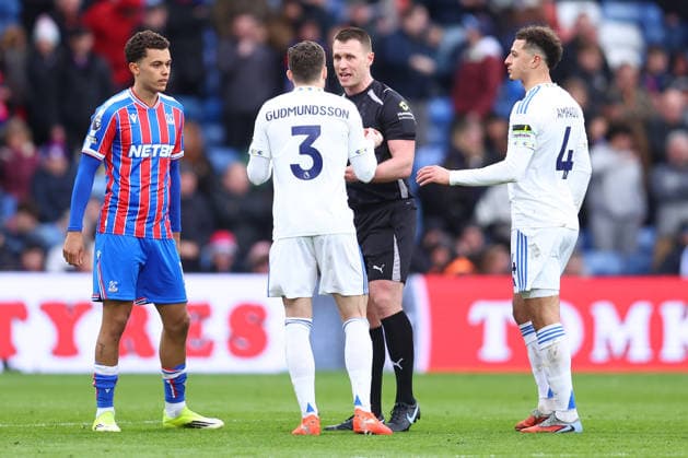 London, England, 15th March 2026. Gabriel Gudmundsson of Leeds United appeals to referee Tom Bramall after he is shown a red card during the Crystal Palace vs Leeds United Premier League match at Selhurst Park, London. Picture credit should read: Paul Terry Sportimage EDITORIAL USE ONLY. No use with unauthorised audio, video, data, fixture lists, club league logos or live services. Online in-match use limited to 120 images, no video emulation. No use in betting, games or single club league player publications. SPI_024_PT_Crystal_Palace_Leeds SPI-4603-0024