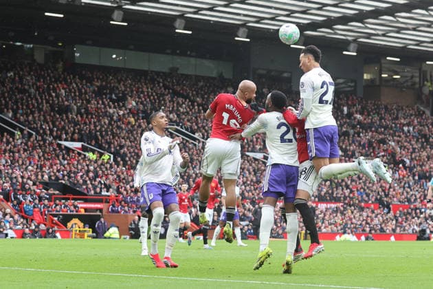 15th March 2026; Old Trafford, Manchester, England; Premier League Football, Manchester United, ManU versus Aston Villa; Morgan Rogers of Aston Villa rises to win the ball  RogerxEvans Content restricted for UK based newspaper