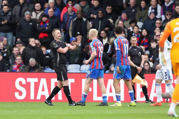 15th March 2026; Selhurst Park, Selhurst, London, England; Premier League Football, Crystal Palace versus Leeds United; Crystal Palace match captain Will Hughes speaks to referee Thomas Bramall about why no second yellow card was given to Jaka Bijol of Leeds United after a foul on Ismaila Sarr of Crystal Palace  KatiexChan Content restricted for UK based newspaper