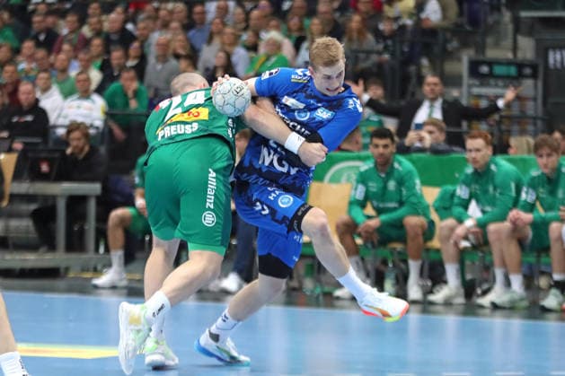 Handball DAIKIN HBL, SC DHfK Leipzig TVB Stuttgart 15 03 2026 Torben Matzken 22, TVB Stuttgart is stopped by Moritz Preuss 24, SC DHfK Leipzig Handball, DAIKIN HBL, 1 Bundesliga, Season 2025 2026, 25 Matchday SC DHfK Leipzig vs TVB Stuttgart on 15 03 2026 at the Quarterback Immobilien Arena Leipzig Copyright: xBEAUTIFULxSPORTS JanxKaeferx