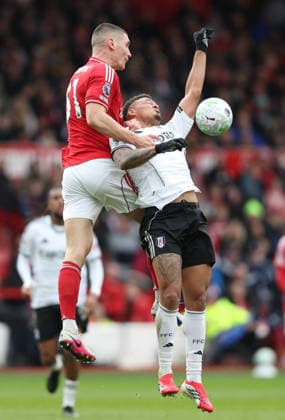 Nottingham, England, 15th March 2026. Nikola Milenkovic of Nottingham Forest challenges Rodrigo Muniz of Fulham during the Nottingham Forest vs Fulham Premier League match at the City Ground, Nottingham. Picture credit should read: Gareth Evans Sportimage EDITORIAL USE ONLY. No use with unauthorised audio, video, data, fixture lists, club league logos or live services. Online in-match use limited to 120 images, no video emulation. No use in betting, games or single club league player publications. SPI_030_GE_NFFC_vs_FFC SPI-4604-0030
