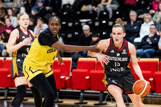 LYON-VILLEURBANNE, FRANCE - MARCH 15: Leonie Fiebich (Germany, 13) controls the ball against Yuliany Paz (Colombia, 6) during the FIBA Women™s World Cup Qualifying Tournament match between Colombia (COL) vs. Germany (GER) at Astroballe on matchday 4 of the FIBA Women™s World Cup Qualifying Tournament on March 15, 2026 in Lyon-Villeurbanne, France. France Copyright: xSteffiexWunderlx