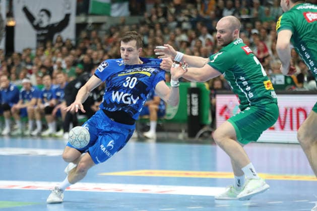 Handball DAIKIN HBL, SC DHfK Leipzig TVB Stuttgart 15 03 2026 Marco Mengon 30, TVB Stuttgart is attacked by Moritz Preuss 24, SC DHfK Leipzig Handball, DAIKIN HBL, 1 Bundesliga, Season 2025 2026, 25 Matchday SC DHfK Leipzig vs TVB Stuttgart on 15 03 2026 at Quarterback Immobilien Arena Leipzig Copyright: xBEAUTIFULxSPORTS JanxKaeferx