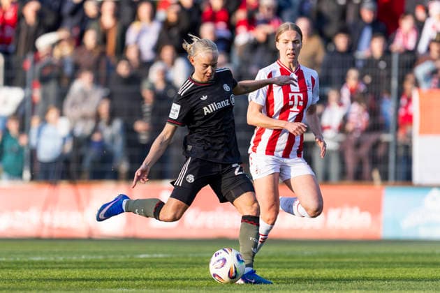 Google Pixel Womens Bundesliga 1 FC Cologne FC Bayern Munich 15 03 2026 Pernille Harder FC Bayern Munich, 21 scores the goal to lead 1 0, Celina Degen 1 FC Cologne, 5 cant stop it on matchday 20 of the Google Pixel Womens Bundesliga in the match between 1 FC Cologne and FC Bayern Munich on 15 03 2026 at Franz Kremer Stadium in Cologne, Germany Copyright: xBEAUTIFULxSPORTS Meuselx