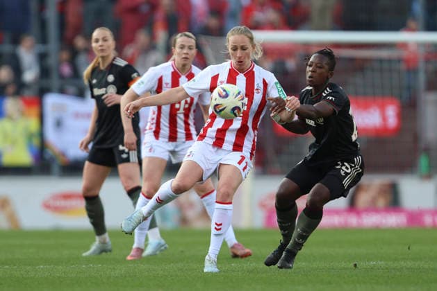 Pauline Bremer 1 FC Köln and Bernadette Kakounan Amani FC Bayern München battle for the ball during the Woman Bundesliga match between 1 FC Köln and Bayern München, Franz Kremer Stadion on March 15 in Cologne, Germany, Germany Photo by Oliver Kaelke DeFodi Images Pauline Bremer 1 FC Köln and Bernadette Kakounan Amani FC Bayern München battle for the ball during the Woman Bundesliga match between 1 FC Köln and Bayern München at Franz Kremer Stadion on March 15, 2026 in Cologne, Germany Photo by Oliver Kaelke DeFodi Images DFL regulations prohibit any use of photographs as image sequences and or quasi video Photo by Oliver Kaelke DeFodi Images