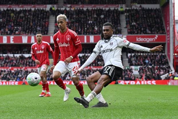 Omari Hutchinson of Nottingham Forest and Alex Iwobi of Fulham Nottingham Forest v Fulham, Premier League, Football, City Ground, Nottingham, UK - 15 Mar 2026Nottingham City Ground United Kingdom EDITORIAL USE ONLY No use with unauthorised audio, video, data, fixture lists, club league logos or live services. Online in-match use limited to 120 images, no video emulation. No use in betting, games or single club league player publications. Copyright: xAnnaxGowthorpe Shutterstockx 16757313ax
