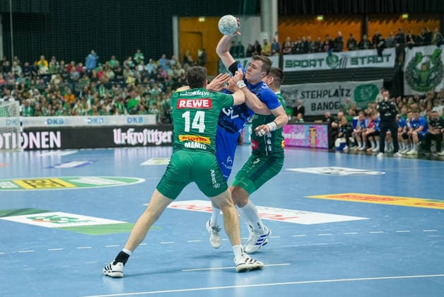 Marco Mengon TVB Stuttgart, 30 in the grip of players of SC DHfK Leipzig SC DHfK Leipzig vs TVB Stuttgart, Handball, 1 Handball Bundesliga, 25 Matchday, Season 2025 2026, 15 03 2026 SC DHfK Leipzig vs TVB Stuttgart, Handball, 1 Handball Bundesliga, 25 Matchday, Season 2025 2026, 15 03 2026 Leipzig Copyright: xEibner-Pressefoto PiaxSchindlerx EP_PSR