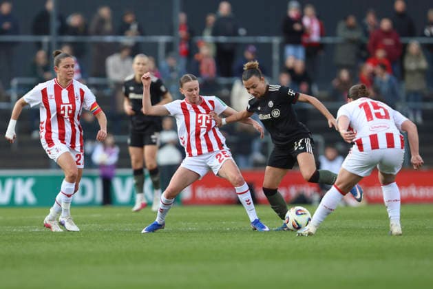 Laura Donhauser 1 FC Köln , Arianna Caruso FC Bayern München and Amelie Bohnen 1 FC Köln in a duel during the Woman Bundesliga match between 1 FC Köln and Bayern München, Franz Kremer Stadion on March 15 in Cologne, Germany Photo by Oliver Kaelke DeFodi Images Laura Donhauser 1 FC Köln , Arianna Caruso FC Bayern München and Amelie Bohnen 1 FC Köln battle for the ball during the Woman Bundesliga match between 1 FC Köln and Bayern München at Franz Kremer Stadion on March 15, 2026 in Cologne, Germany Photo by Oliver Kaelke DeFodi Images DFL regulations prohibit any use of photographs as image sequences and or quasi video Photo by Oliver Kaelke DeFodi Images