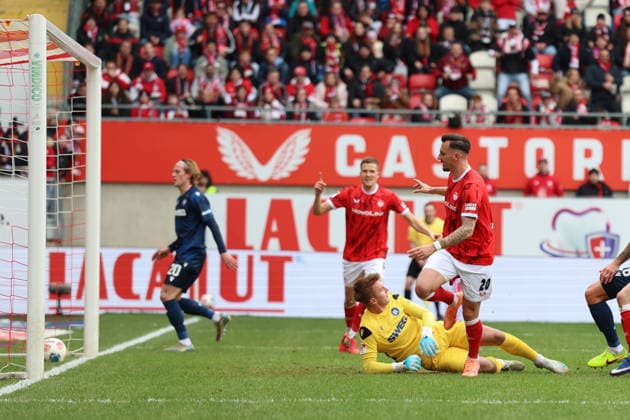 15 03 2026, xrekx, Fußball 2 Bundesliga, 1 FC Kaiserslautern Karlsruher SC v l Goal shot to 2 0 by Mergim Berisha 1 FC Kaiserslautern Hans Christian Bernat Karlsruher SC DFL DFB REGULATIONS PROHIBIT ANY USE OF PHOTOGRAPHS as IMAGE SEQUENCES and or QUASI VIDEO Kaiserslautern