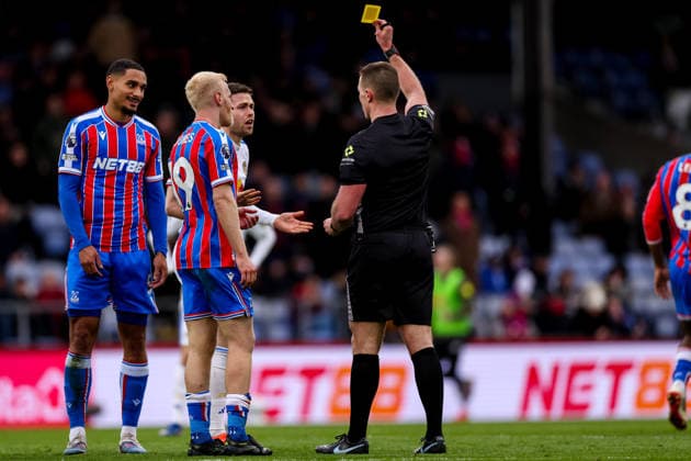 LONDON, ENGLAND - MARCH 15: Gabriel Gudmundsson of Leeds United receives his second yellow card from referee Thomas Bramall during the Premier League match between Crystal Palace and Leeds United at Selhurst Park on March 15, 2026 in London, England.  Copyright: xRenexNijhuis MBxMediax