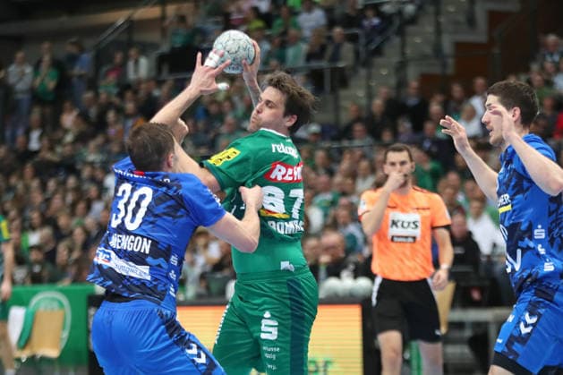 Handball DAIKIN HBL, SC DHfK Leipzig TVB Stuttgart 15 03 2026 Dean Bombac 67, SC DHfK Leipzig is attacked by Marco Mengon 30, TVB Stuttgart Handball, DAIKIN HBL, 1 Bundesliga, Season 2025 2026, 25 Matchday SC DHfK Leipzig vs TVB Stuttgart on 15 03 2026 at Quarterback Immobilien Arena Leipzig Copyright: xBEAUTIFULxSPORTS JanxKaeferx