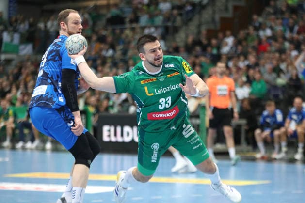 Handball DAIKIN HBL, SC DHfK Leipzig TVB Stuttgart 15 03 2026 Luka Rogan 33, SC DHfK Leipzig throws Handball, DAIKIN HBL, 1 Bundesliga, Season 2025 2026, 25 Matchday SC DHfK Leipzig vs TVB Stuttgart on 15 03 2026 at the Quarterback Immobilien Arena Leipzig Copyright: xBEAUTIFULxSPORTS JanxKaeferx