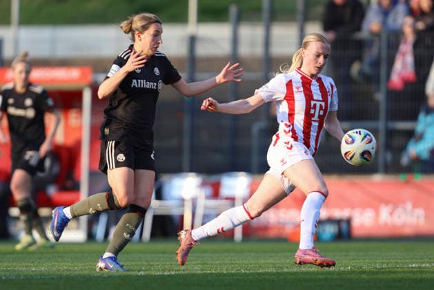 Barbara Dunst FC Bayern München and Anna Gerhardt 1 FC Köln battle for the ball during the Woman Bundesliga match between 1 FC Köln and Bayern München at Franz Kremer Stadion on March 15 in Cologne, Germany, Germany Photo by Oliver Kaelke DeFodi Images Barbara Dunst FC Bayern München and Anna Gerhardt 1 FC Köln battle for the ball during the Woman Bundesliga match between 1 FC Köln and Bayern München at Franz Kremer Stadion on March 15, 2026 in Cologne, Germany Photo by Oliver Kaelke DeFodi Images DFL regulations prohibit any use of photographs as image sequences and or quasi video Photo by Oliver Kaelke DeFodi Images