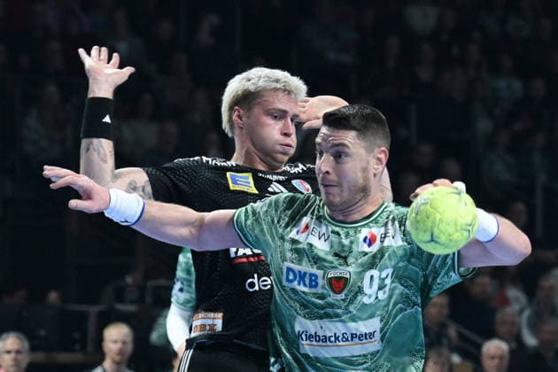 15 03 2026, xlakx, Handball Daikin HBL, Fuechse Berlin HC Erlangen v l Marek Nissen HC Erlangen , Mijajlo Marsenic Fuechse Berlin duel, duel, fight, tackle Berlin Daniel Lakomski