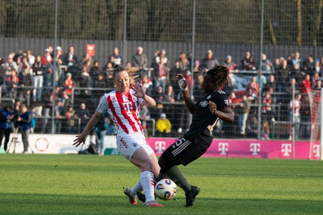 COLOGNE, GERMANY - MARCH 15: Weronika Zawistowska (10 1. FC Köln) and Bernadette Amani (15 FC Bayern München) during the Google Pixel Frauen-Bundesliga between 1. FC Köln and FC Bayern München at Stadion an der Hafenstraße on March 15, 2026 in Cologne, Germany. ?Photo by Qianru Zhang Press Photo) Copyright: xQianruxZhang SPPx Sportspressphoto_SPR110659