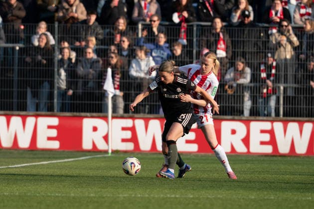 COLOGNE, GERMANY - MARCH 15: Barbara Dunst (28 FC Bayern München) and Anna Gerhardt (21 1. FC Köln) during the Google Pixel Frauen-Bundesliga between 1. FC Köln and FC Bayern München at Stadion an der Hafenstraße on March 15, 2026 in Cologne, Germany. ?Photo by Qianru Zhang Press Photo) Copyright: xQianruxZhang SPPx Sportspressphoto_SPR110660