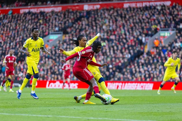 Football - FA Premier League - Liverpool FC v Tottenham Hotspur FC LIVERPOOL, ENGLAND - Sunday, March 15, 2026: Liverpool s Jeremie Frimpong is challenged by Tottenham Hotspur s Djed Spence (R) during the FA Premier League match between Liverpool FC and Tottenham Hotspur FC at Anfield. (Photo by David Rawcliffe Propaganda) LIVERPOOL Anfield MERSEYSIDE ENGLAND  Copyright: xDavidxRawcliffex P2026-03-15-Liverpool_Tottenham-65