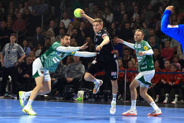 DEU, DHB, 1 HBL, Fuechse Berlin vs Erlangen, 15 03 2026, Max Schmeling Halle, Berlin, DEU, DHB, 1 HBL, Fuechse Berlin vs Erlangen, pictured Nejc Cehte Fuechse Berlin 22 , Mathias Gidsel Fuechse Berlin 19 , Sander Overjordet Erlangen 8 nordphotoxGmbHx xEngler nph00076