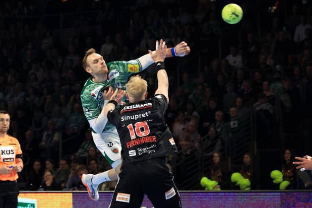 DEU, DHB, 1 HBL, Fuechse Berlin vs Erlangen, 15 03 2026, Max Schmeling Halle, Berlin, DEU, DHB, 1 HBL, Fuechse Berlin vs Erlangen, in the picture Mathias Gidsel Fuechse Berlin 19 , Sebastian Firnhaber Erlangen 18 nordphotoxGmbHx xEngler nph00076