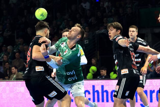 DEU, DHB, 1 HBL, Fuechse Berlin vs Erlangen, 15 03 2026, Max Schmeling Halle, Berlin, DEU, DHB, 1 HBL, Fuechse Berlin vs Erlangen, in the picture Mathias Gidsel Fuechse Berlin 19 , Tobias Buck Erlangen 39 , Florian Scheerer Erlangen 10 nordphotoxGmbHx xEngler nph00076