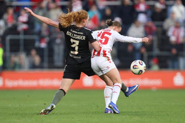 Stine Ballisager Pedersen FC Bayern München and Laura Donhauser 1 FC Köln battle for the ball during the Woman Bundesliga match between 1 FC Köln and Bayern München, Franz Kremer Stadion on March 15 in Cologne, Germany, Germany Photo by Oliver Kaelke DeFodi Images Stine Ballisager Pedersen FC Bayern München and Laura Donhauser 1 FC Köln battle for the ball during the Woman Bundesliga match between 1 FC Köln and Bayern München at Franz Kremer Stadion on March 15, 2026 in Cologne, Germany Photo by Oliver Kaelke DeFodi Images DFL regulations prohibit any use of photographs as image sequences and or quasi video Photo by Oliver Kaelke DeFodi Images