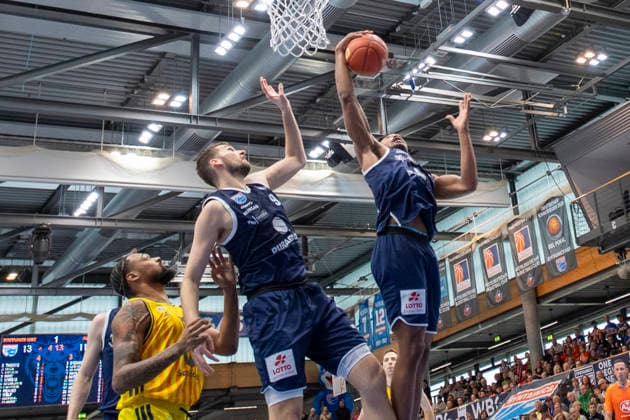 EasyCredit Basketball Bundesliga 2025 2026 Syntainics MBC vs Alba Berlin Weissenfels, Germany 15 March 2026 In the picture from left in the duel J Wan Roberts Berlin , Kresimir Nikic Weissenfels and Marcus Foster Weissenfels Weissenfels Stadthalle Weissenfels Saxony Anhalt Germany
