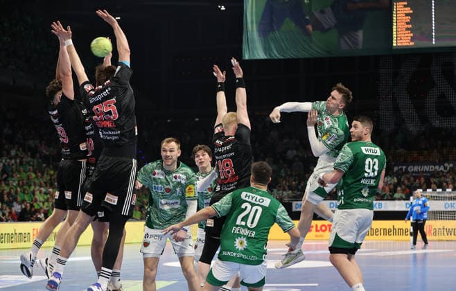 Tobias Buck, Tim Gömmel, Sebastian Firnhaber, Lasse Andersson throws duel Game scene Action Sport Handball HBL Bundesliga Men 25 Matchday Season 2025 2026 15 03 2026 Füchse Berlin vs HC Erlangen HCE