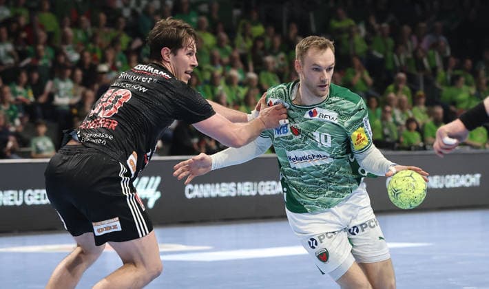 Florian Scheerer, Mathias Gidsel duel Match scene Action Sport Handball HBL Bundesliga Men 25 Matchday Season 2025 2026 15 03 2026 Füchse Berlin vs HC Erlangen HCE
