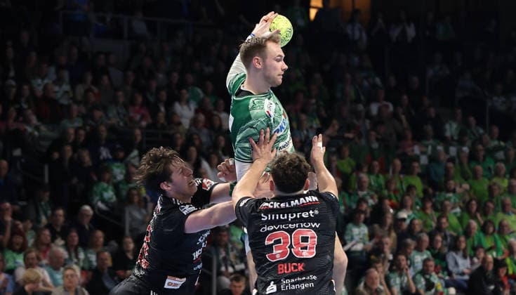 Florian Scheerer, Mathias Gidsel on the ball, Tobias Buck duel Match scene Action Sport Handball HBL Bundesliga Men 25 Matchday Season 2025 2026 15 03 2026 Füchse Berlin vs HC Erlangen HCE